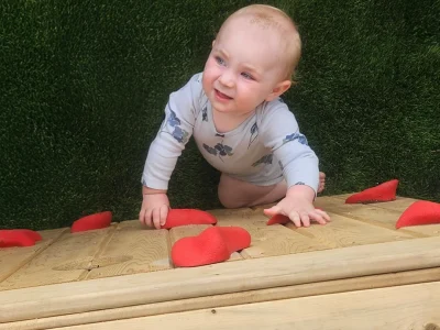 Infants, toddlers, and preschoolers engaging in activities at Laurel Play Gardens Childcare in San Jose