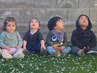 Infants, toddlers, and preschoolers engaging in activities at Laurel Play Gardens Childcare in San Jose